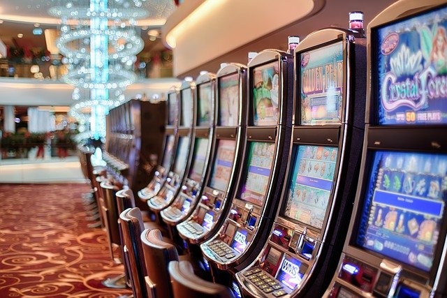 A line of slot machines in a casino